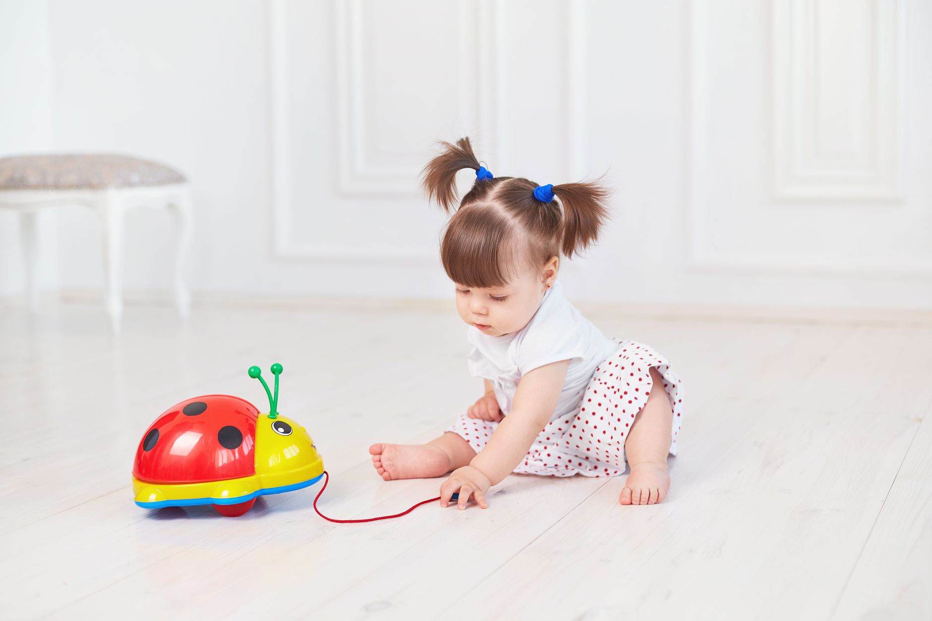 Toddler playing with toy