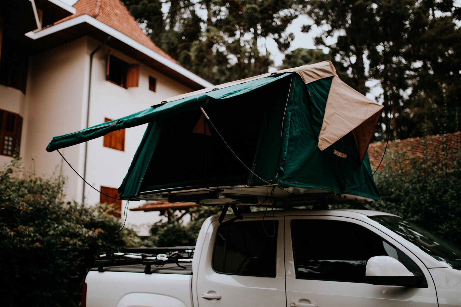 Green tent on pickup truck